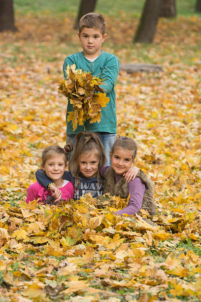istock Kids enjoying at park in autumn 466244468