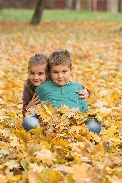 istock Happy children in the autumn park 466246660