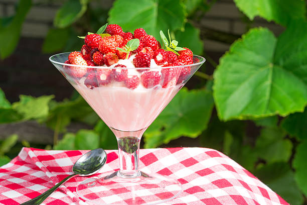 istock Woodland strawberry with whipped cream 466247545