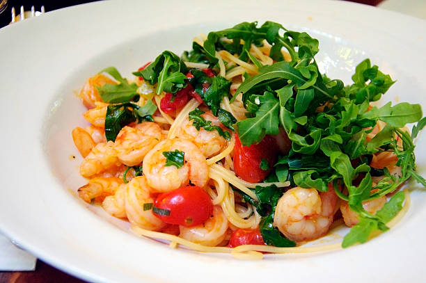 Spaghetti with Shrimps and Tomatoes stock photo