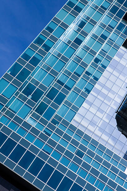 istock abstract glass side of business building 466249585