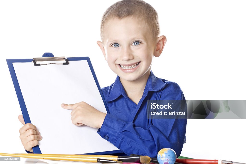 Beautiful Boy in blue chemise Beautiful boy with blue eyes and blue chemise drawing Boys Stock Photo