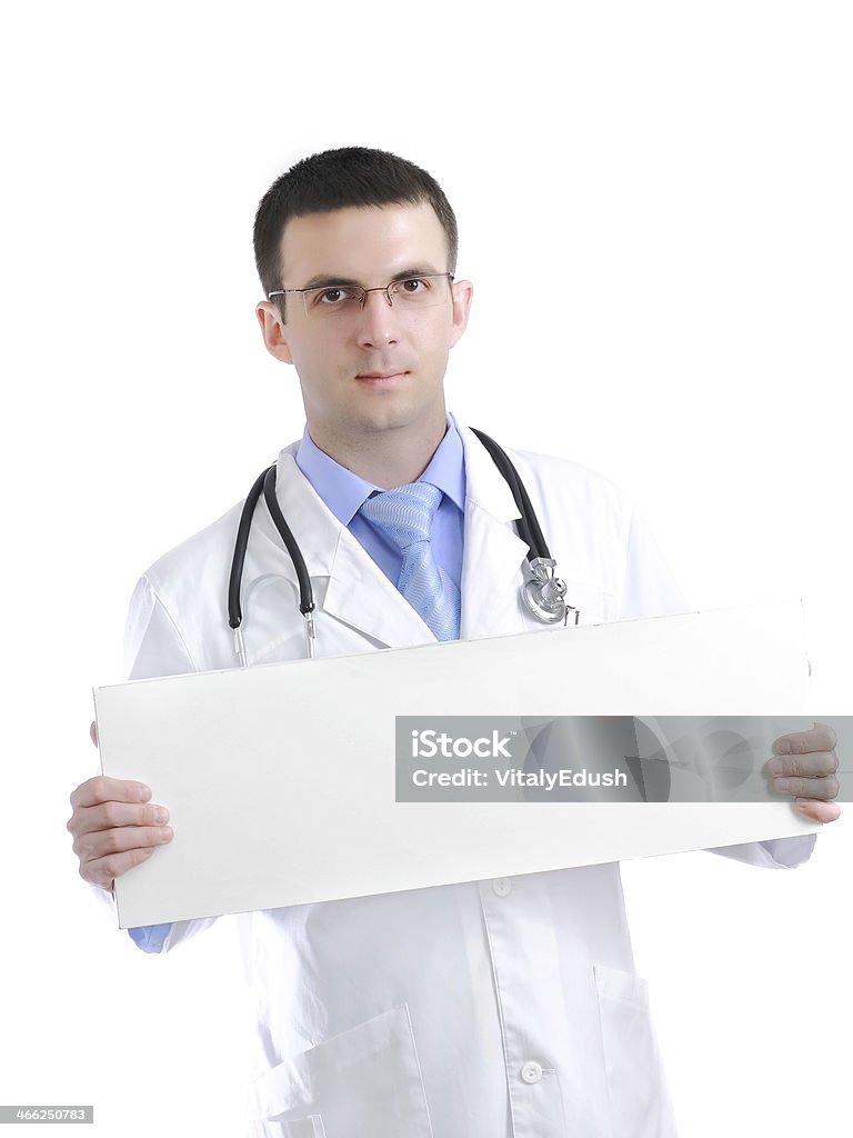 Médico com um cartaz em branco. Isolado - Foto de stock de Adulto royalty-free