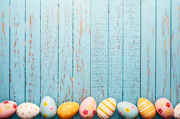 istock Easter Eggs on Old Blue Wood - Season Background Frame 466251032