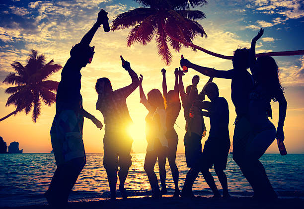 istock People Enjoying Party by the Beach 466251154