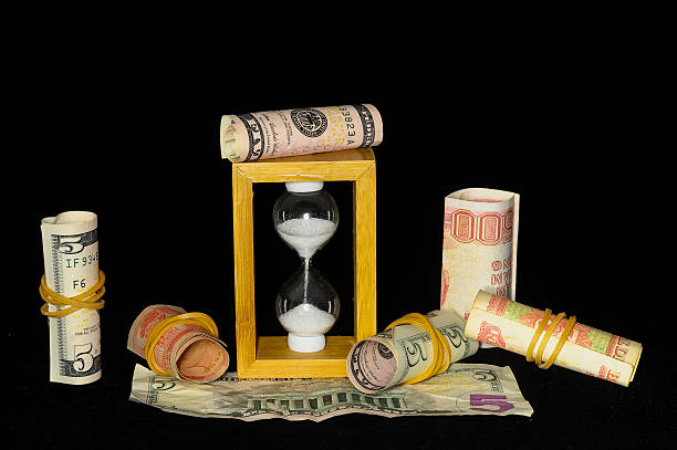 concetto di business ora - making money gold euro symbol time foto e immagini stock