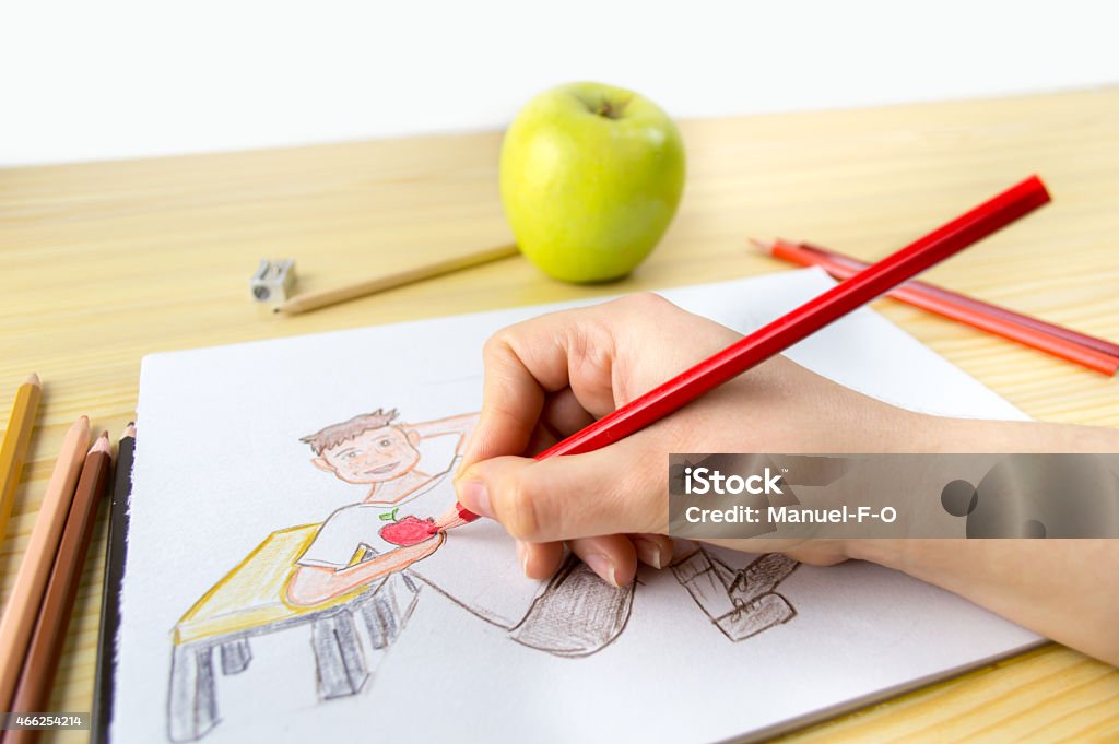 young drawing a child close up of young woman drawing a child eating an apple 2015 Stock Photo