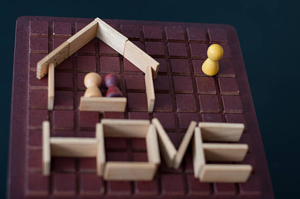 istock Two figures at home and one, lonely outside 466254719