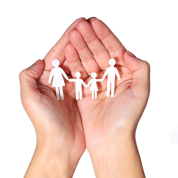 istock Paper Family in Hands isolated on white 466255175