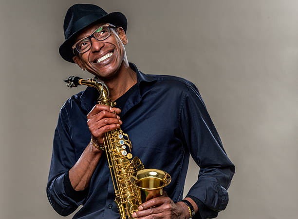 istock Musician with saxophone and big smile 466255532