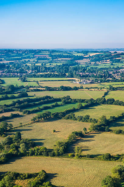 istock Aerial view over villages and rural fields patchwork quilt landscape 466260502