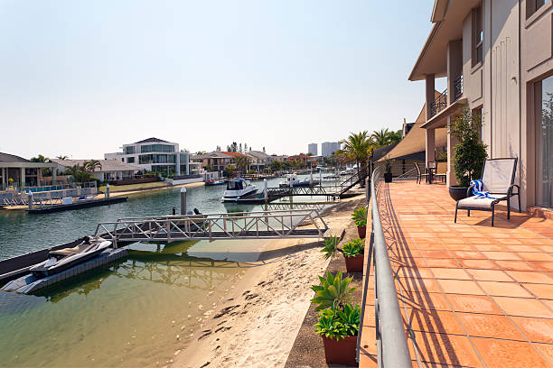 istock lake and pier behind modern australian mansion 466261893