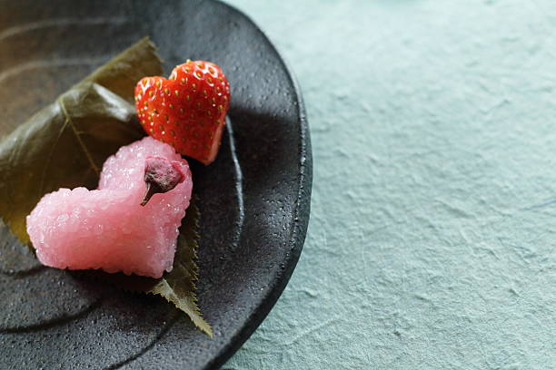 istock Mochi with salted cherry flower and leaf 466264282