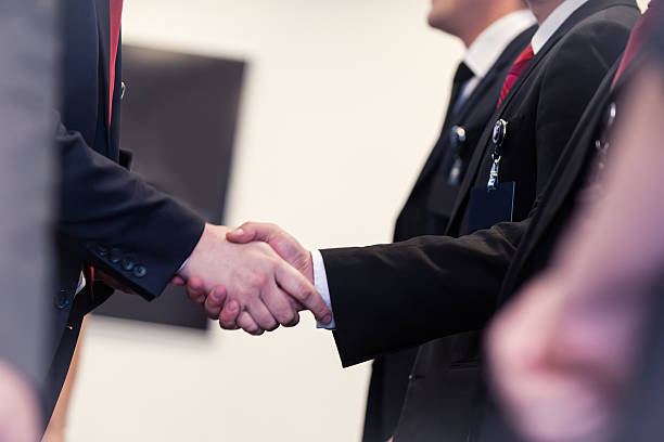 istock Business people shaking hands 466264291