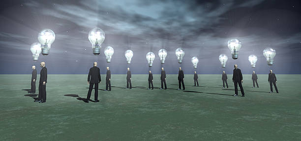istock businessmen with glowing bulbs over their head's 466264784