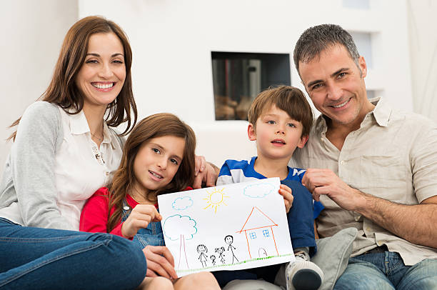 istock Family with new house drawing 466265243