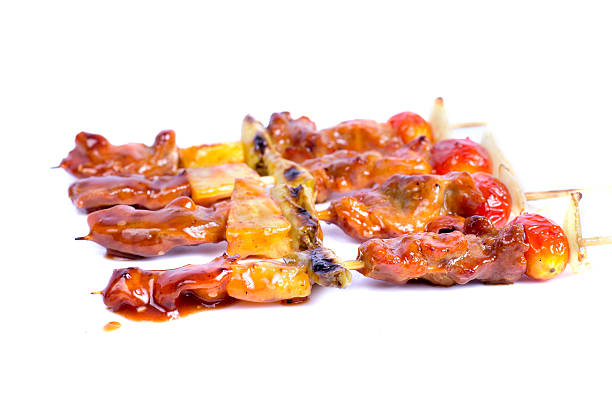 istock grilled pork fillet and vegetables on white background 466265971