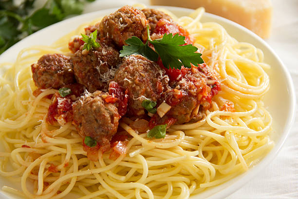 istock Pasta with meatballs in tomato sauce. 466266347