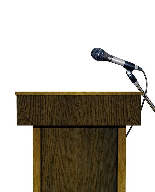 Podium with Microphone over White stock photo