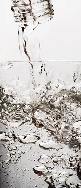istock glass with bottle and water 466267333