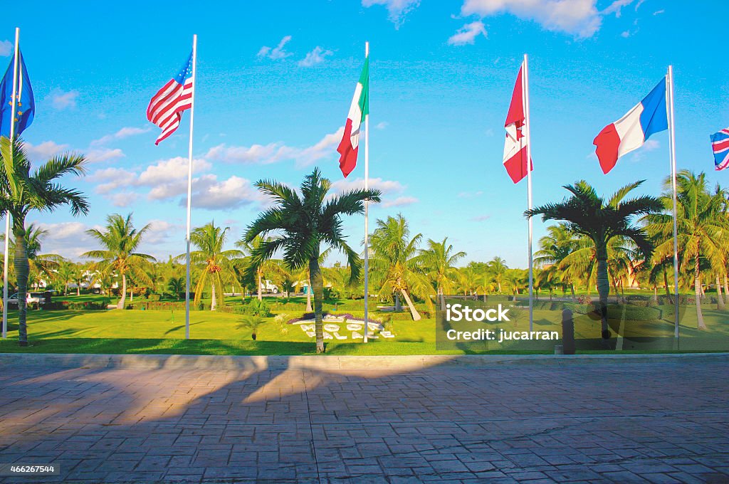 Various flags on the beach outside of Resort Horizontal end colorful photo of many flags on the outdoors of a resort Country - Geographic Area Stock Photo