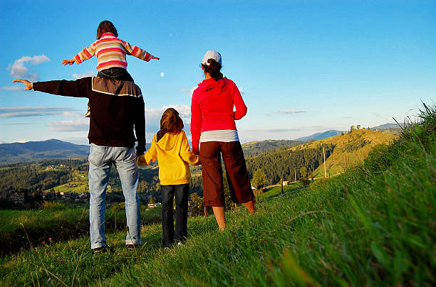istock Happy family on vacation in mountains 466268819