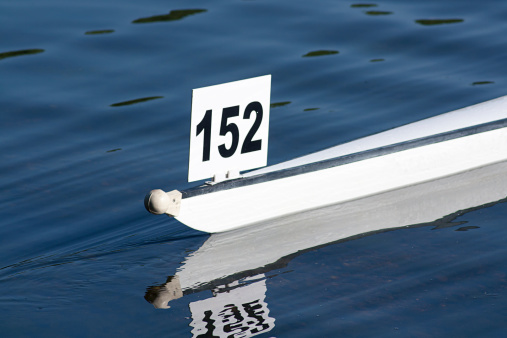 Racing boat shell competing in a competitive rowing race