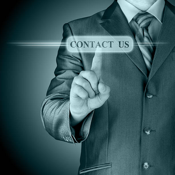 istock Businessman pushing CONTACT US sign 466273145