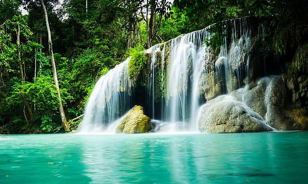 erawan wasserfall national park - erawan beauty in nature waterfall clean stock-fotos und bilder