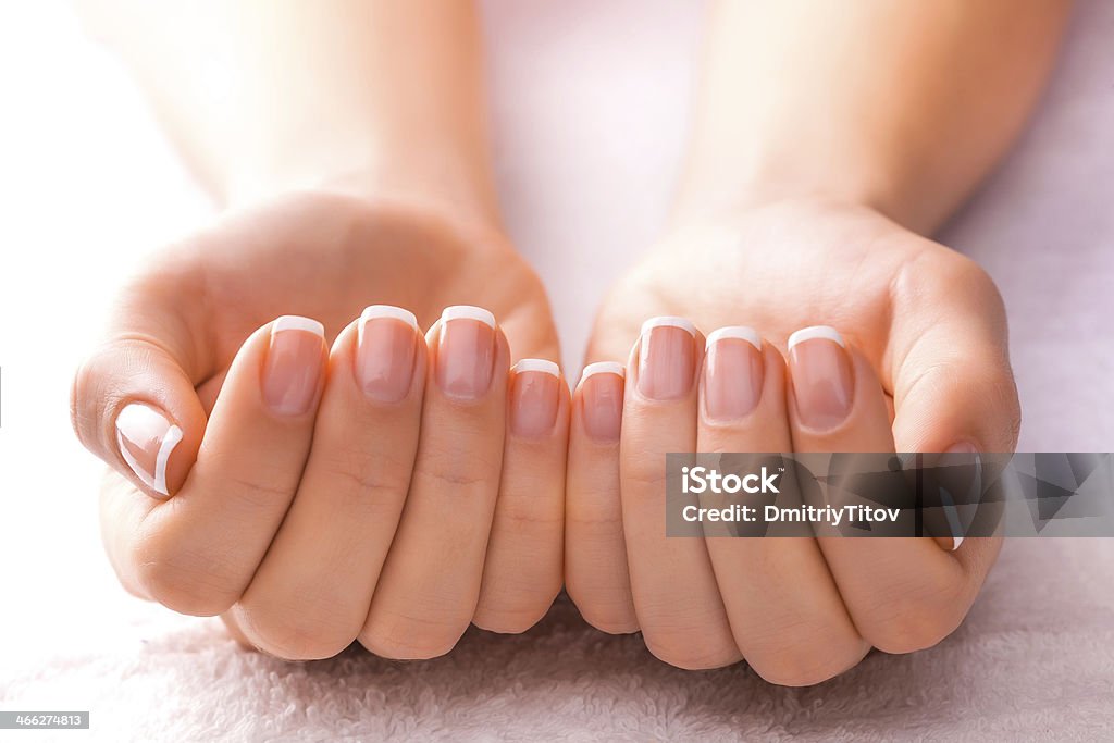 manicure on the white towel beautiful manicure on the white towel Adult Stock Photo