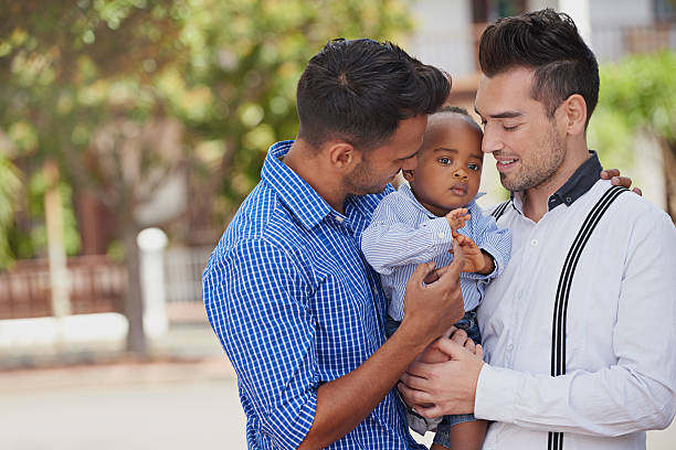 daddy's little boy - baby beautiful little boys carrying stock-fotos und bilder