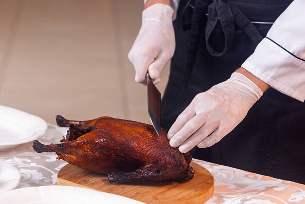 istock cooking roast duck in restaurant 466276378
