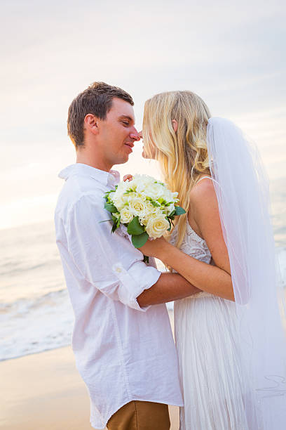 istock Married couple, bride and groom at sunset on beautiful tropical 466279421