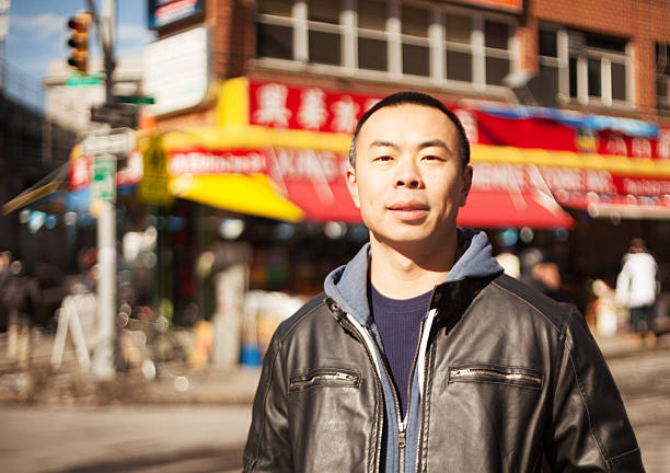 Young Chinese man in Chinatown in New York City. 