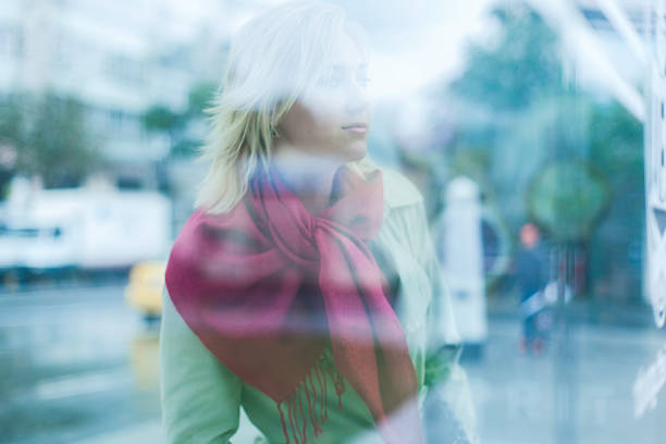 One young blond woman is in a bus station in Istanbul Turkey. Shot for 2014 Istanbul istcockaypsse.
