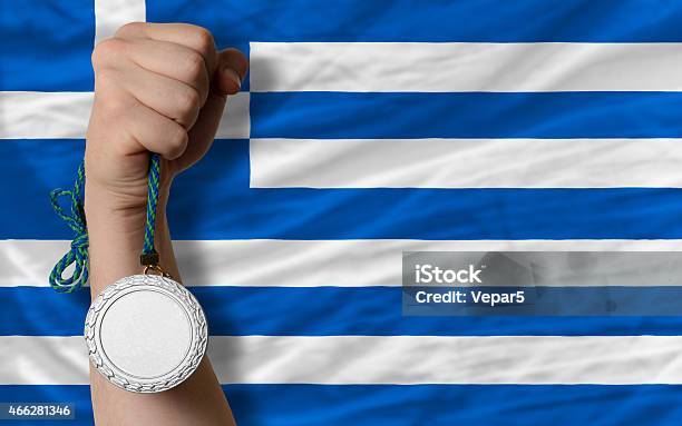 Silver Medal For Sport And Flag Of Greece Stock Photo - Download Image Now - 2015, Achievement, Adult