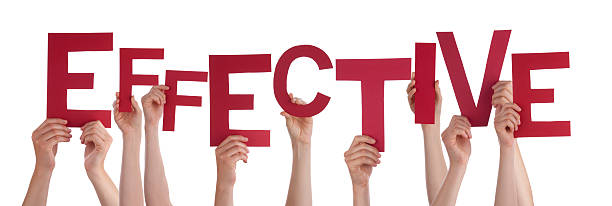 istock Many People Hands Holding Red Word Effective 466281622