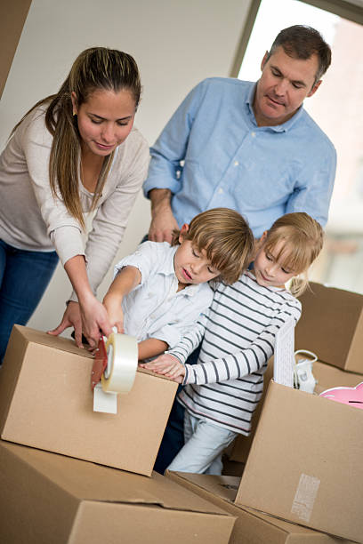 istock Family moving house and packing 466282498
