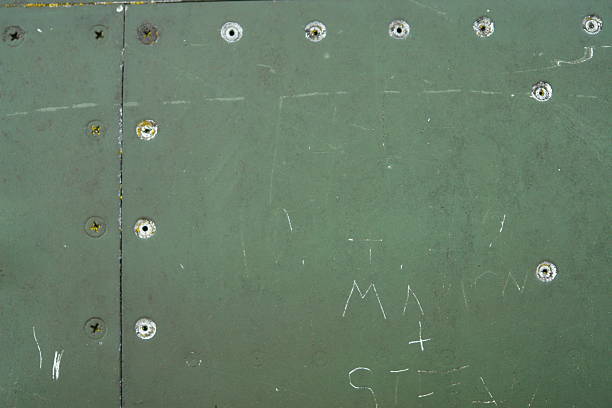 Aircraft background military metal close-up Details of an old grungy army aircraft.. iron county wisconsin stock pictures, royalty-free photos & images