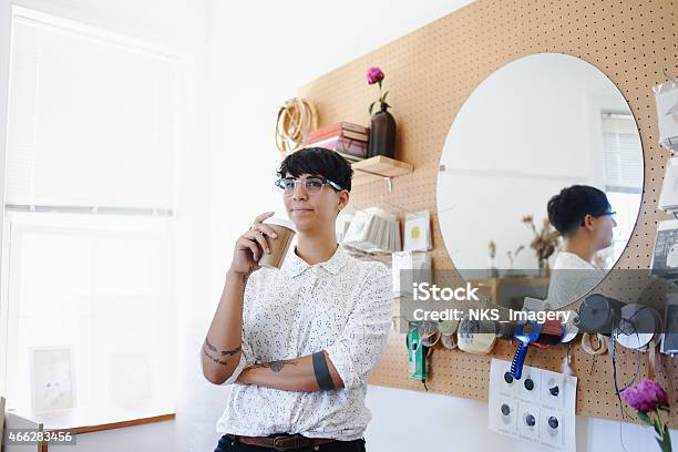 Considering Her Next Project Stock Photo - Download Image Now - 20-29 Years, 2015, Adult