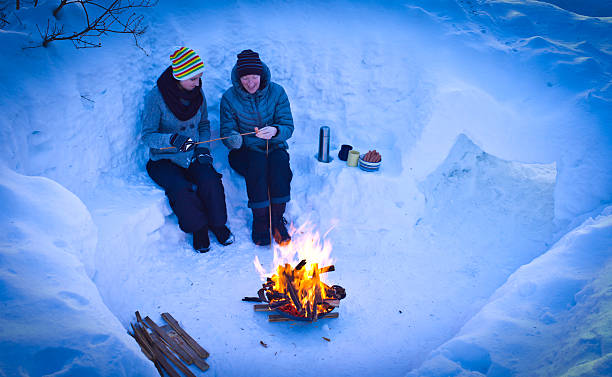 istock Mother and Daughter Cook Hot Dogs Over a Fire Pit. 466284310