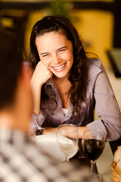 istock Beautiful young woman smiling at her partner 466285832