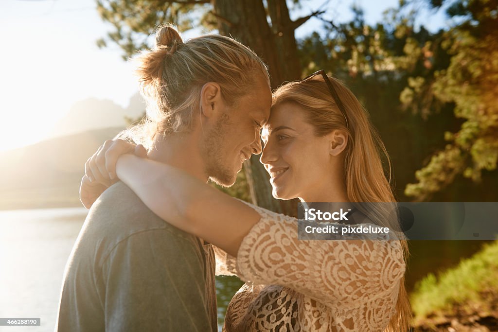 Loving you comes naturally Shot of an affectionate young couple sharing a romantic moment at the lake http://195.154.178.81/DATA/istock_collage/a5/shoots/785123.jpg 20-29 Years Stock Photo