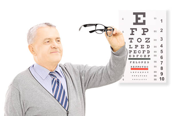 istock Senior gentleman standing in front of eyesight test 466288821