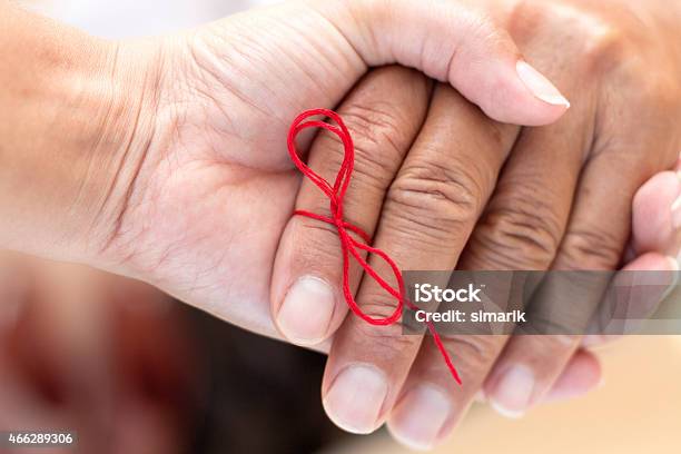 Helping Hand For Memory Loss Stock Photo - Download Image Now - Alzheimer's Disease, Dementia, Red