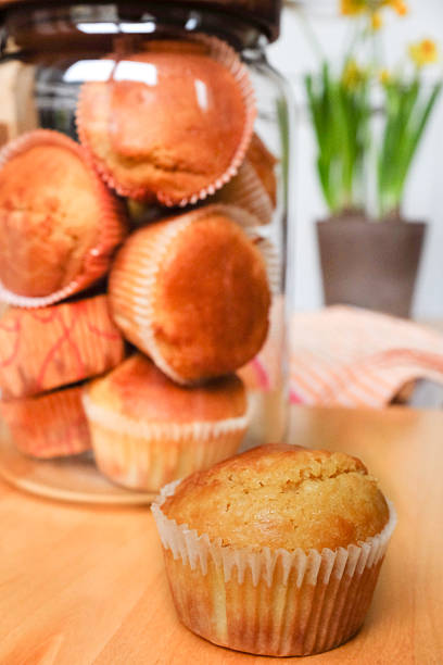 istock Freshly baked homemade corn muffin on wooden table 466290132