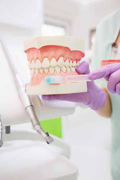 istock Dental Hygiene  Demonstration correct tooth brushing 466290184