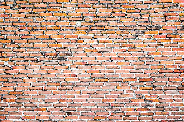 textura de la pared de ladrillo viejo naranja - retro revival pattern masonry old fotografías e imágenes de stock