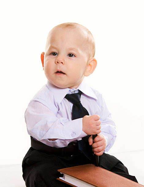 istock Serious little businessman 466293684