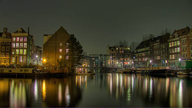 istock Amsterdam, Netherlands, night view in winter. 466293796